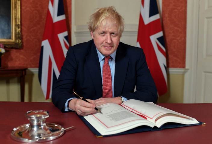 Boris Johnson signs the EU Withdrawal Agreement